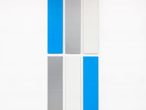 Image of work by Don Dudley. Two rows of each three vertical rectangular panels in blue, silver, white and silver, white, blue.